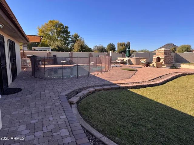 a view of a house with a snow in the background