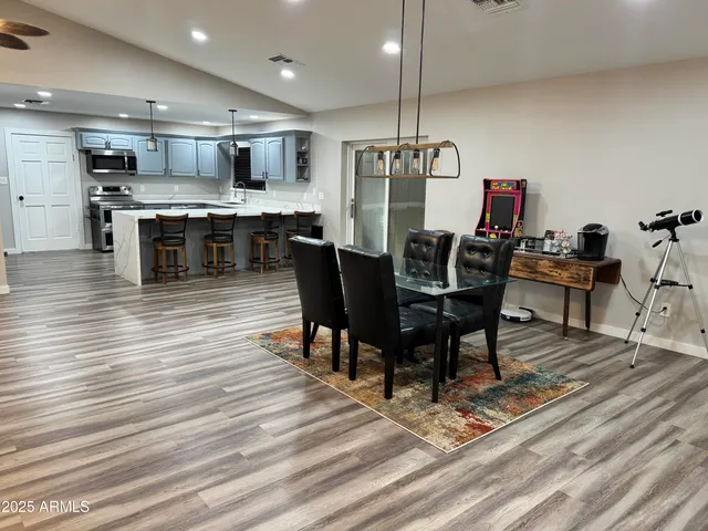 a view of a dining room with furniture