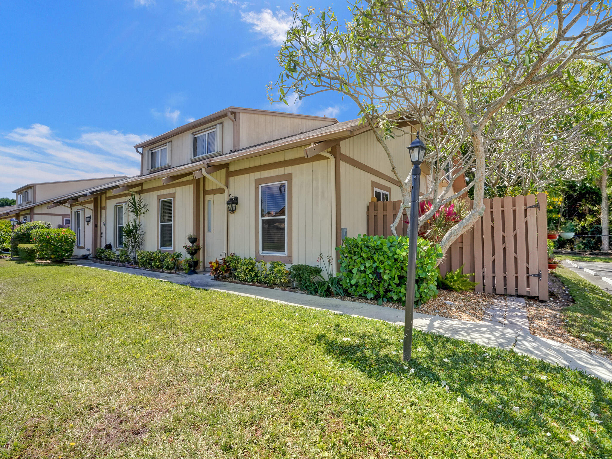 313 Maplecrest Circle Jupiter, FL 33458 - Photo 1 of 30 Townhouse Front