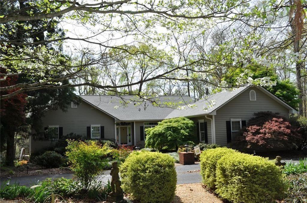 731 Hidden Lakes Trail Jefferson, GA 30549 - Photo 1 of 70 a front view of house with yard and green space