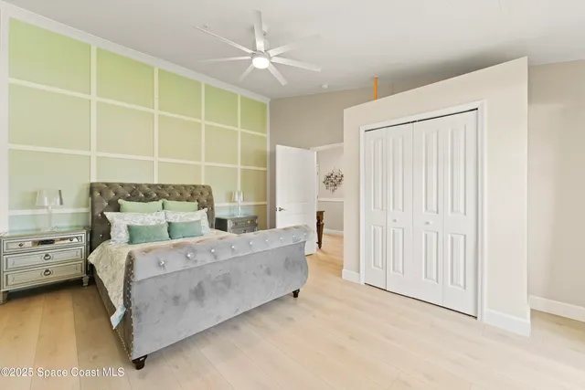 a bed room with a bed and a window