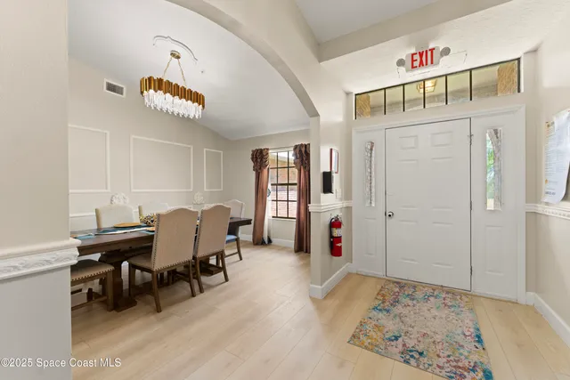 a view of a livingroom with furniture and window