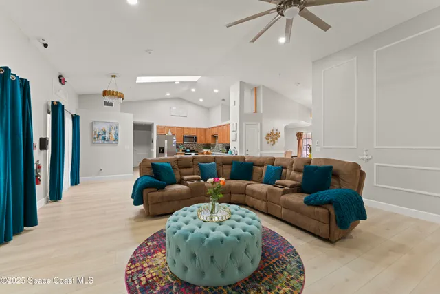 a living room with furniture and a rug