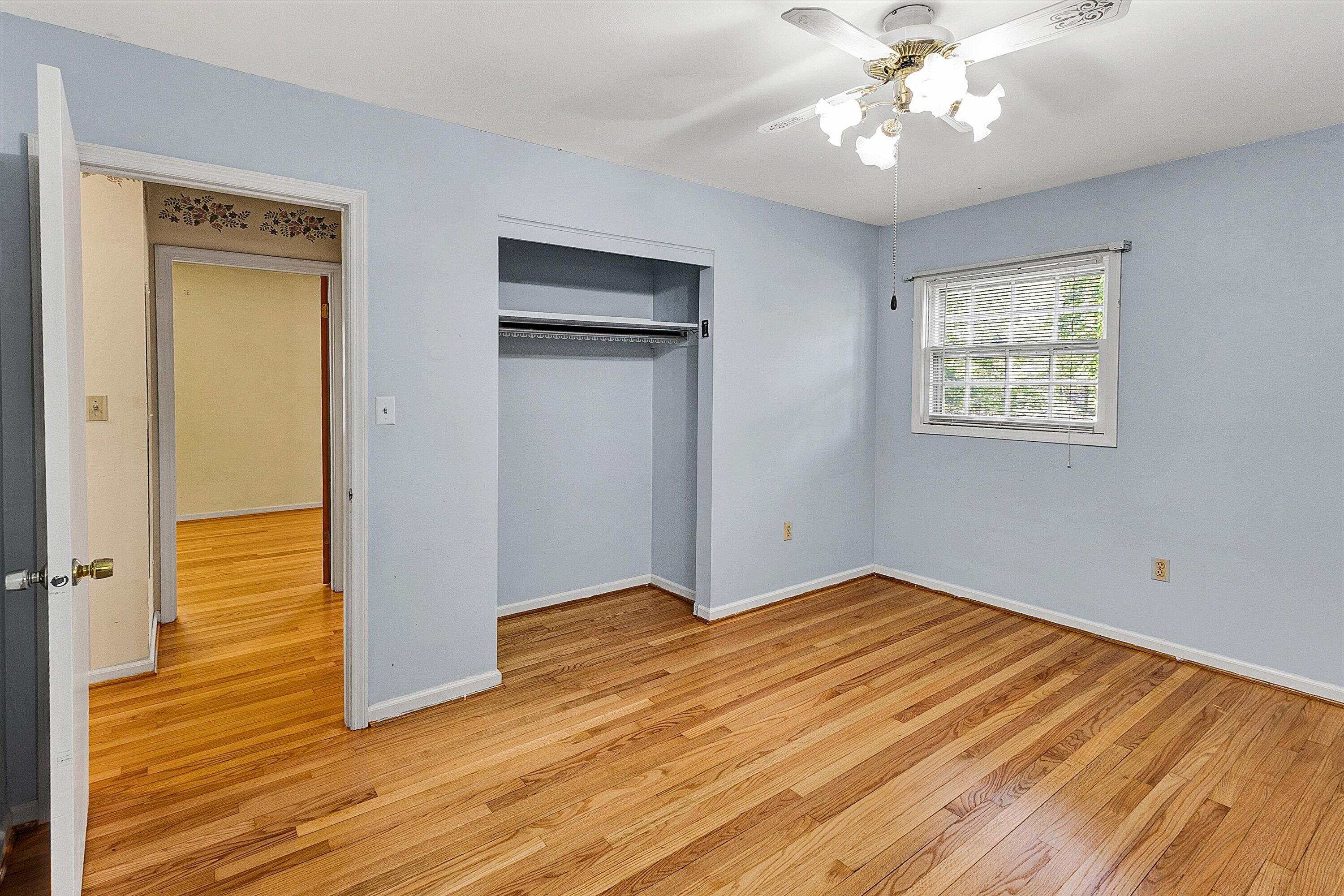 912 Cherokee Trail Covington, VA 24426 - Photo 13 of 31 wooden floor in an empty room with a window