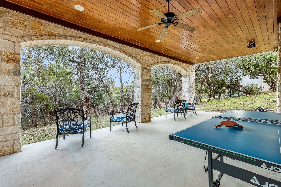 17704 Regatta View Drive Jonestown, TX 78645 - Photo 30 of 38 a dining room with furniture and wooden floor