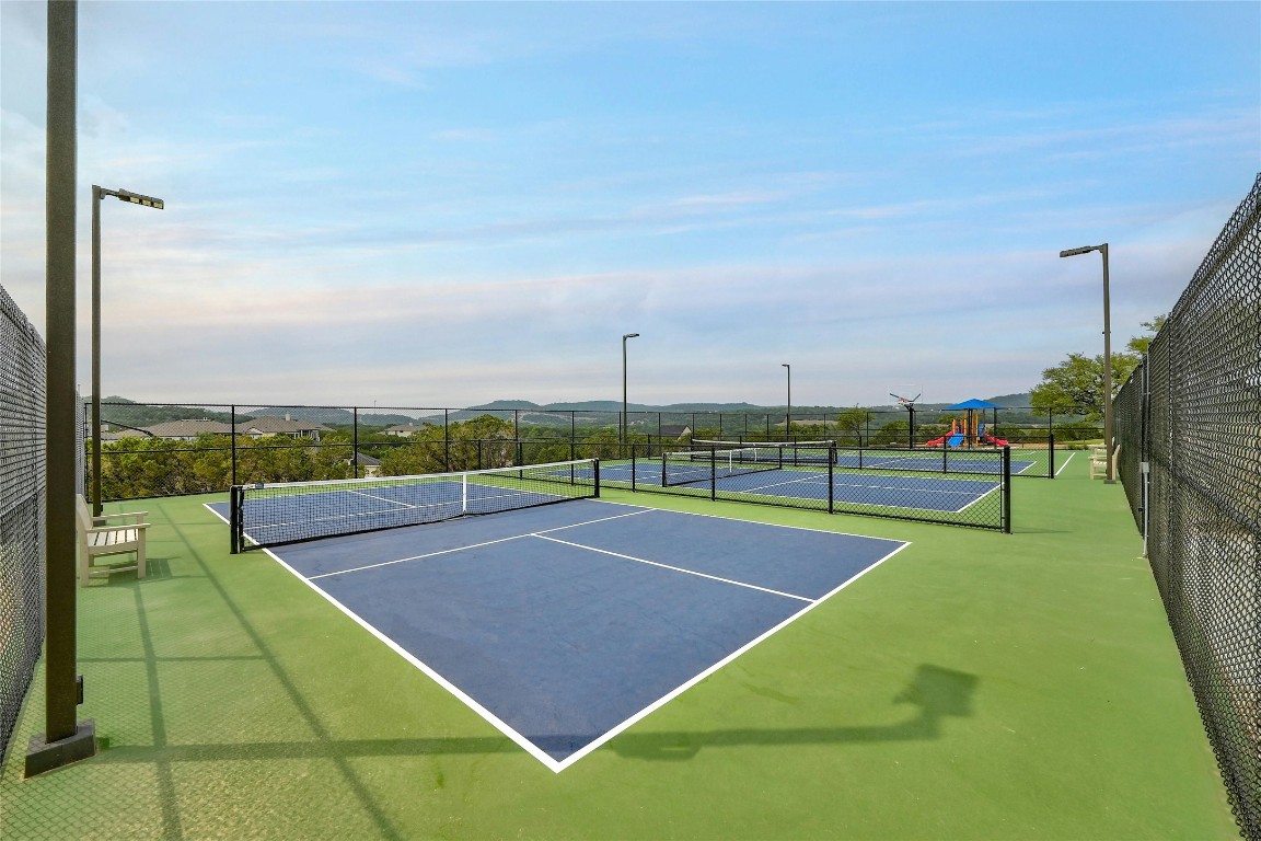 17704 Regatta View Drive Jonestown, TX 78645 - Photo 37 of 38 a view of a tennis court