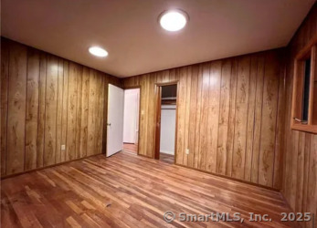 958 Dunbar Hill Road Hamden, CT 06514 - Photo 16 of 22 an empty room with closet and windows