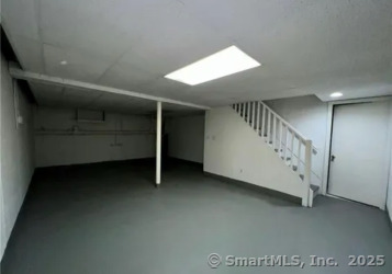 958 Dunbar Hill Road Hamden, CT 06514 - Photo 19 of 22 a view of an empty room with stairs