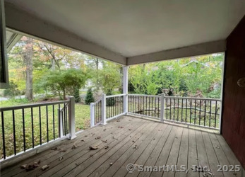 958 Dunbar Hill Road Hamden, CT 06514 - Photo 22 of 22 a balcony with wooden floor and outdoor space