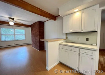 958 Dunbar Hill Road Hamden, CT 06514 - Photo 6 of 22 a view of a kitchen with electric appliances