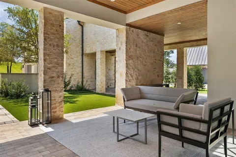 a outdoor living space with furniture and garden