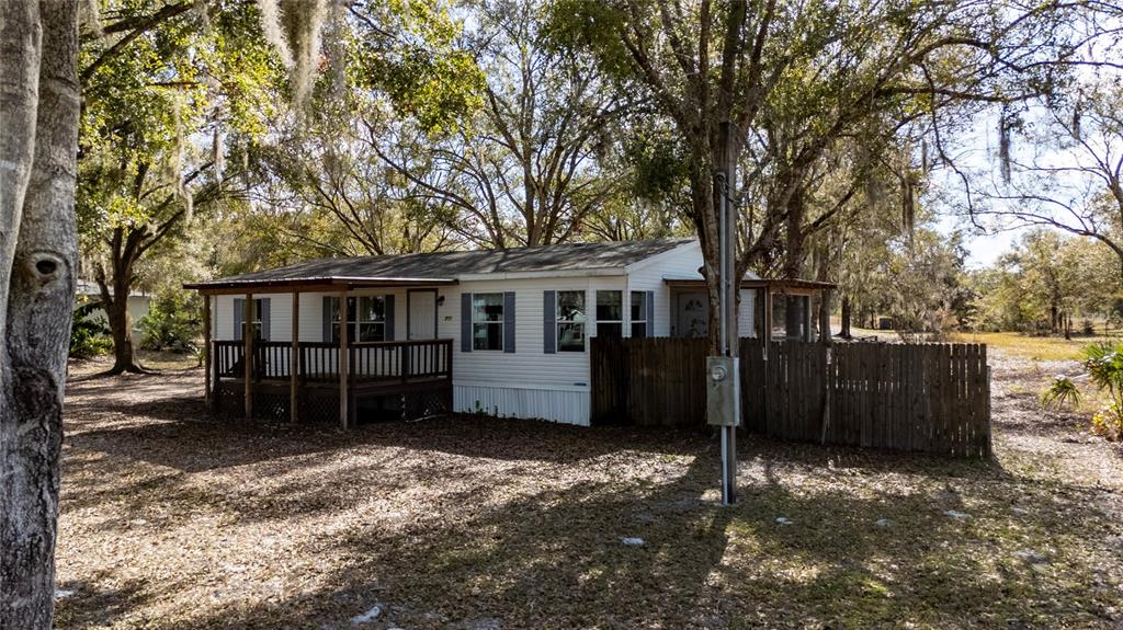 915 Keen Road, Unit 915 Frostproof, FL 33843 - Photo 1 of 53 front view of a house with a yard