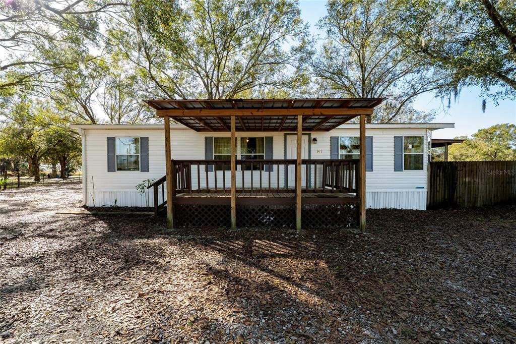 915 Keen Road, Unit 915 Frostproof, FL 33843 - Photo 2 of 53 a house view with a garden space