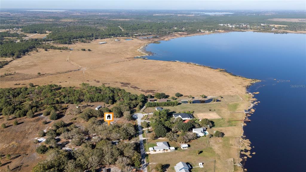 915 Keen Road, Unit 915 Frostproof, FL 33843 - Photo 30 of 53 an aerial view of ocean with beach
