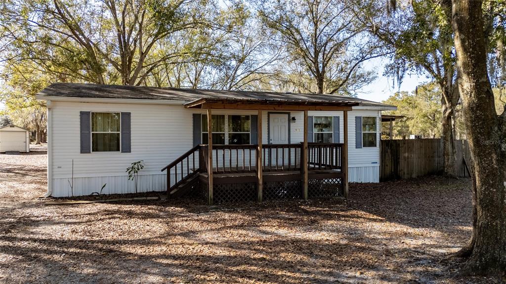 915 Keen Road, Unit 915 Frostproof, FL 33843 - Photo 3 of 53 a view of a house with a yard