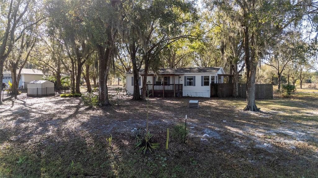 915 Keen Road, Unit 915 Frostproof, FL 33843 - Photo 4 of 53 a view of a house with a yard