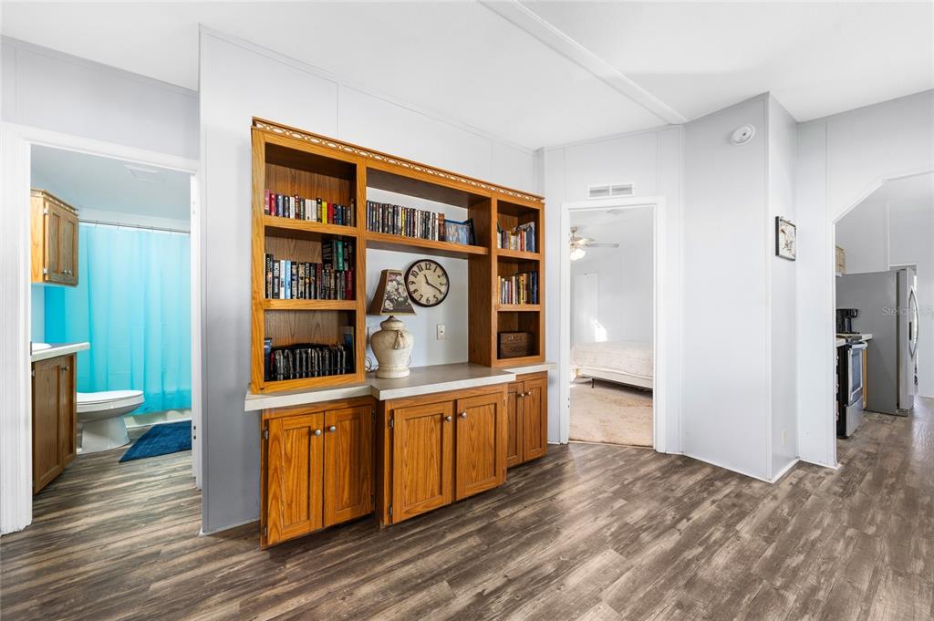 915 Keen Road, Unit 915 Frostproof, FL 33843 - Photo 43 of 53 a room with furniture and view of kitchen