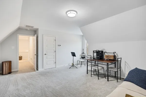 a view of a livingroom with furniture and a couch