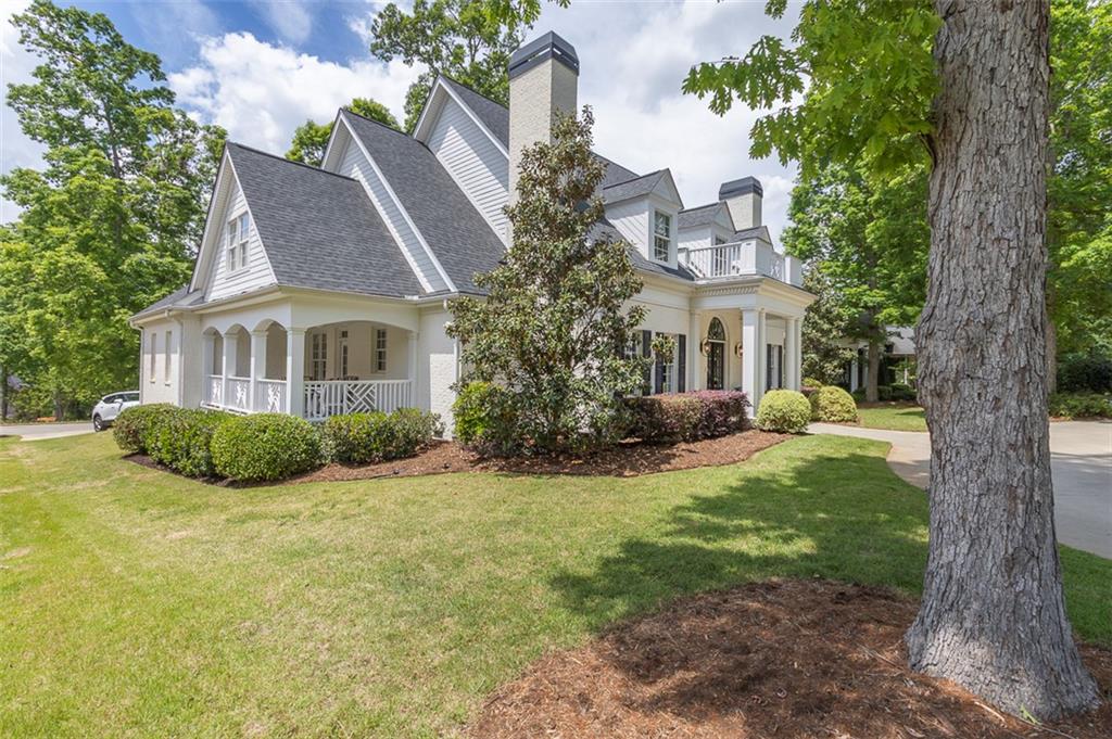 316 Avenue Of Oaks Anderson, SC 29621 - Photo 1 of 50 This classic white home showcases charming architectural details and a well-maintained lawn.
