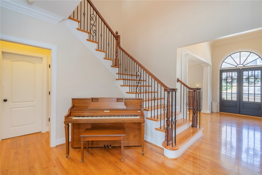 316 Avenue Of Oaks Anderson, SC 29621 - Photo 11 of 50 This spacious foyer features polished hardwood floors and a grand staircase.