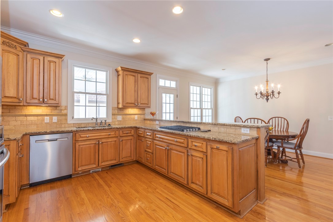 316 Avenue Of Oaks Anderson, SC 29621 - Photo 12 of 50 This spacious kitchen offers ample countertop space and opens to a welcoming dining area.