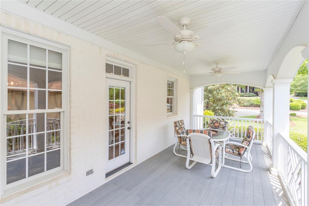 316 Avenue Of Oaks Anderson, SC 29621 - Photo 17 of 50 This inviting covered porch provides an ideal space for outdoor relaxation and entertaining.