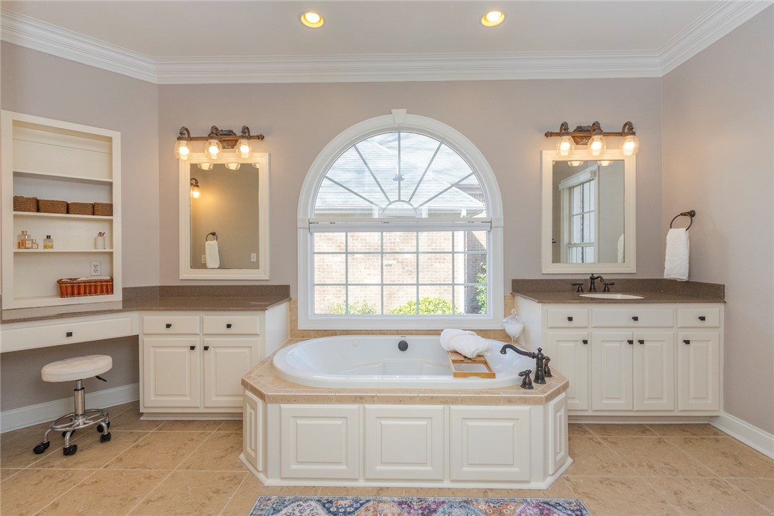 316 Avenue Of Oaks Anderson, SC 29621 - Photo 23 of 50 This spacious bathroom offers a large soaking tub and dual vanities for ultimate comfort.