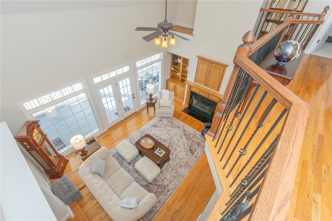 316 Avenue Of Oaks Anderson, SC 29621 - Photo 26 of 50 This airy living space features soaring ceilings, a cozy fireplace, and rich hardwood floors.