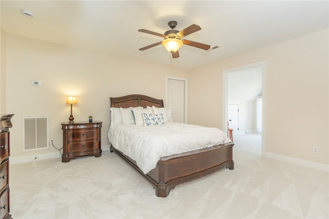 316 Avenue Of Oaks Anderson, SC 29621 - Photo 28 of 50 This spacious bedroom offers comfortable living with soft carpeting and an inviting ambiance.