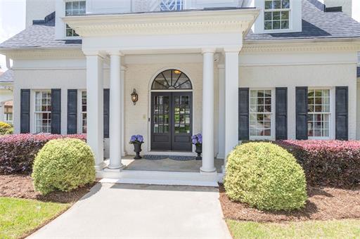 316 Avenue Of Oaks Anderson, SC 29621 - Photo 3 of 50 Elegant entrance welcomes with classic architectural details and lush landscaping.