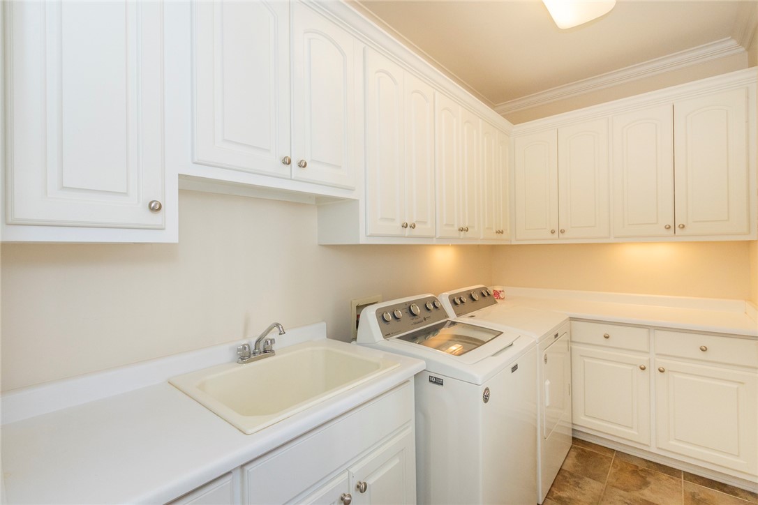 316 Avenue Of Oaks Anderson, SC 29621 - Photo 32 of 50 This spacious utility room offers ample storage and a practical layout.