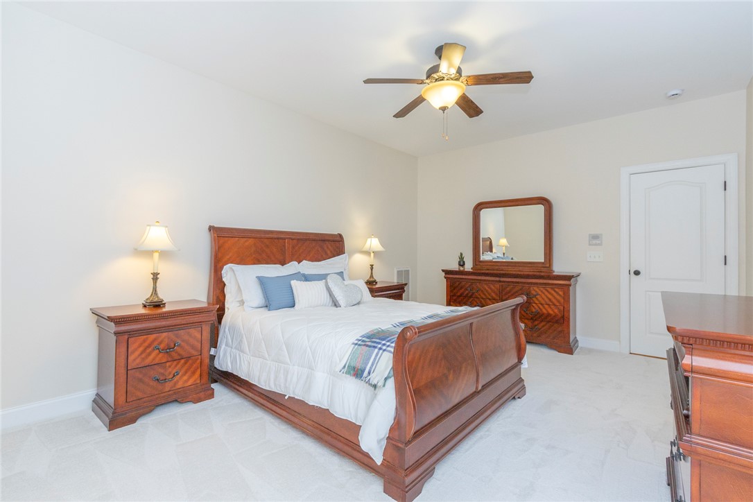 316 Avenue Of Oaks Anderson, SC 29621 - Photo 38 of 50 This spacious bedroom offers comfortable living with elegant finishes and a serene atmosphere.