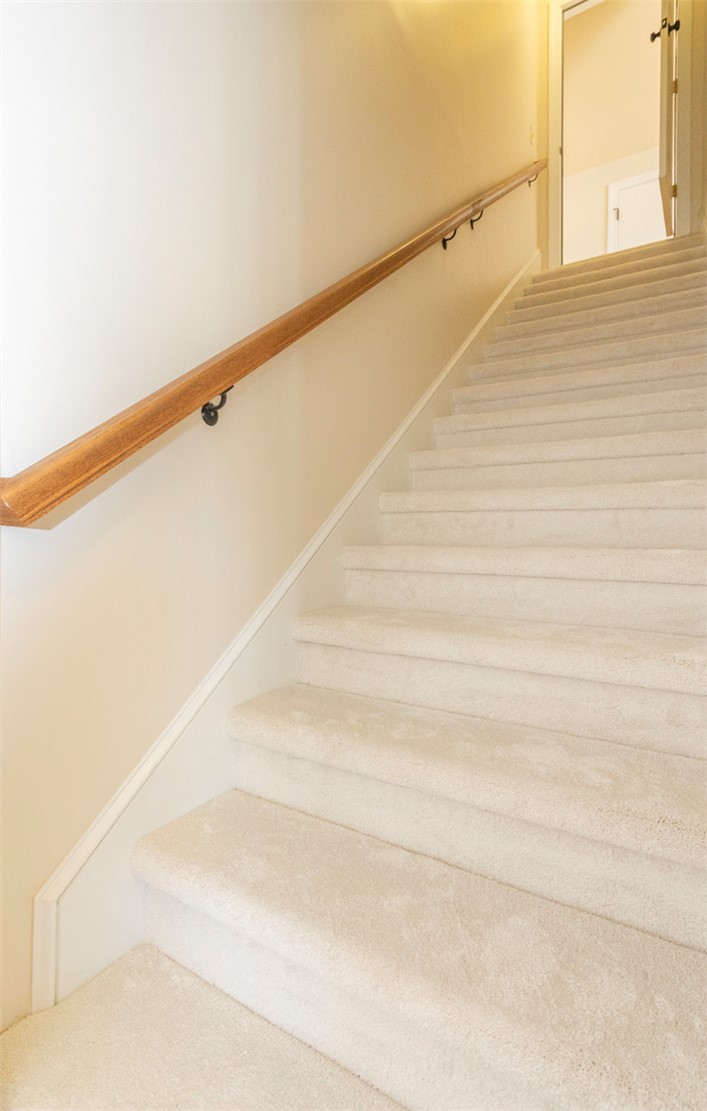 316 Avenue Of Oaks Anderson, SC 29621 - Photo 40 of 50 This carpeted staircase leads to the upper level, offering comfortable passage throughout the home.