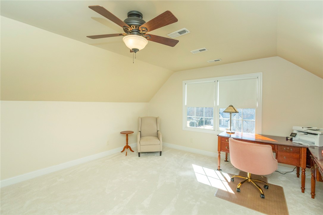 316 Avenue Of Oaks Anderson, SC 29621 - Photo 41 of 50 This bright room features a sloped ceiling and window offering abundant natural light.