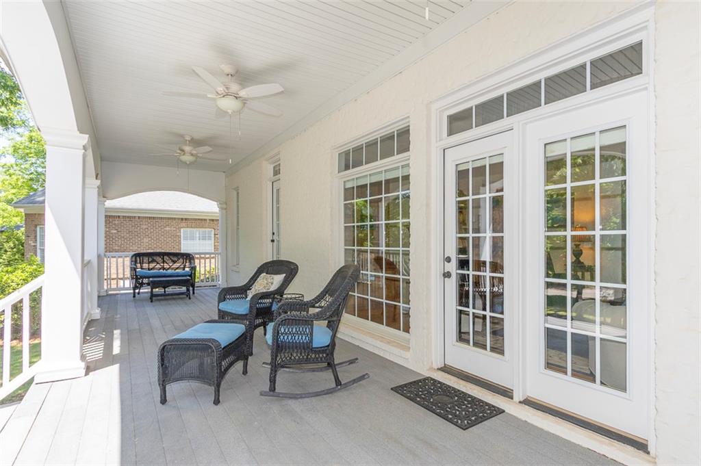 316 Avenue Of Oaks Anderson, SC 29621 - Photo 42 of 50 An inviting porch provides a serene outdoor living area, perfect for relaxation and enjoying the views.