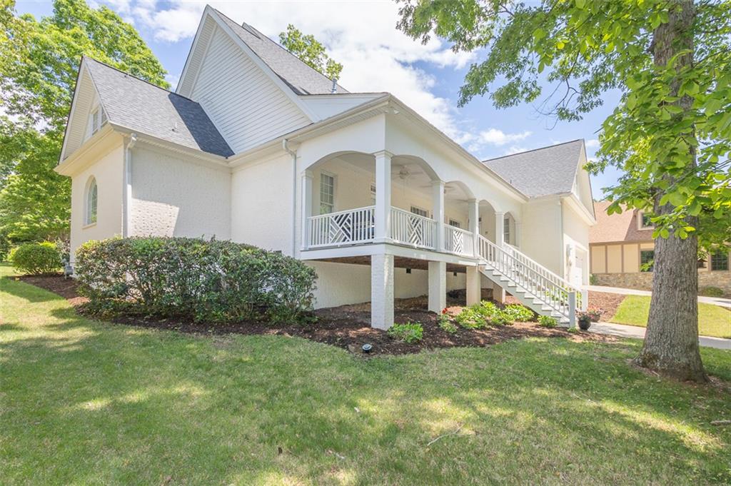 316 Avenue Of Oaks Anderson, SC 29621 - Photo 47 of 50 This classic white home features a charming porch, offering comfortable outdoor living.