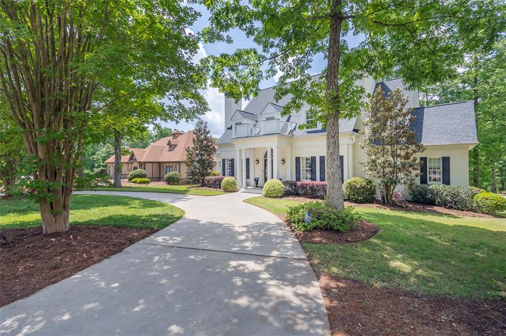316 Avenue Of Oaks Anderson, SC 29621 - Photo 49 of 50 This charming home features a beautifully manicured lawn and a spacious driveway.