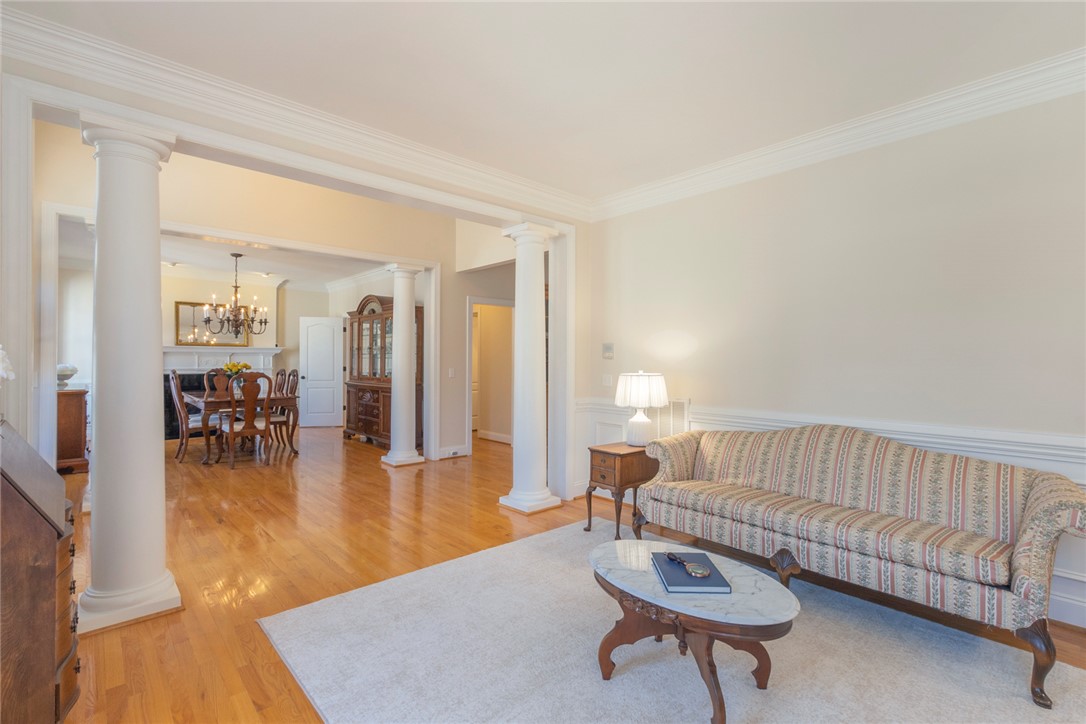 316 Avenue Of Oaks Anderson, SC 29621 - Photo 50 of 50 This bright living space showcases an open floorplan with hardwood floors.