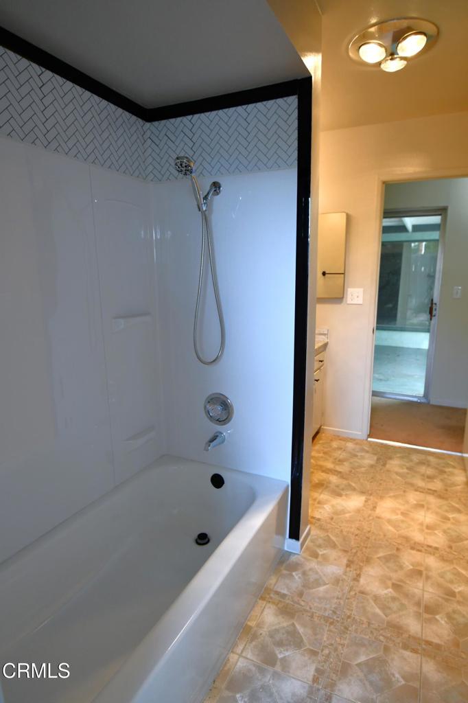 1731 Bernadette Street Oxnard, CA 93036 - Photo 23 of 30 a bathroom with a bath tub and shower