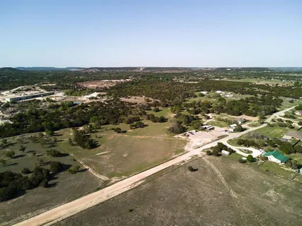 an aerial view of residential building and ocean