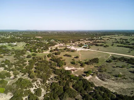 an aerial view of beach and ocean