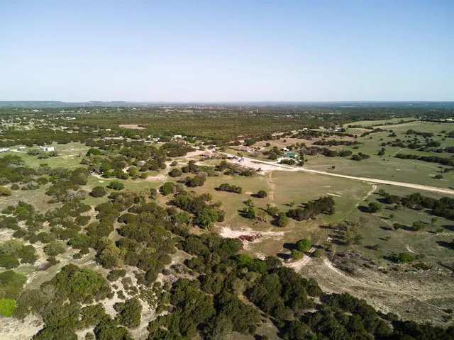 an aerial view of beach and ocean