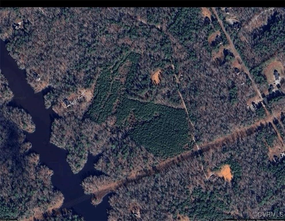 3270 Diascund Reservoir Road Lanexa, VA 23089 - Photo 12 of 12 a view of a yard with large trees