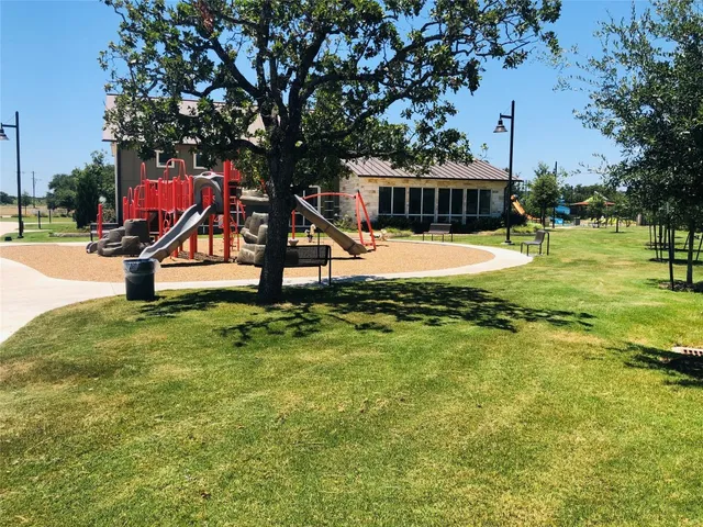 a view of a park with tree s