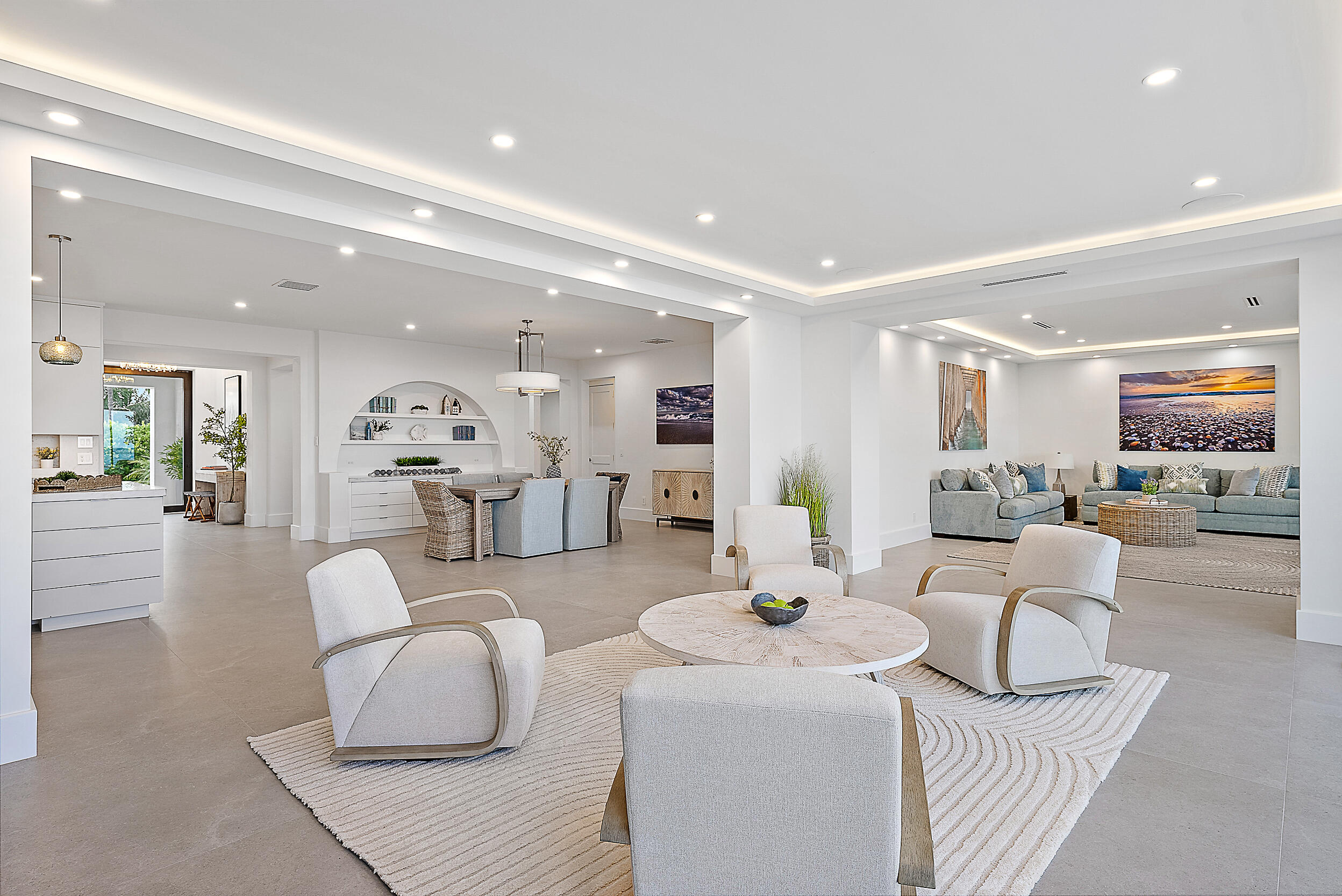 22 Ocean Drive Jupiter Inlet Colony, FL 33469 - Photo 11 of 36 a living room with furniture and view of kitchen