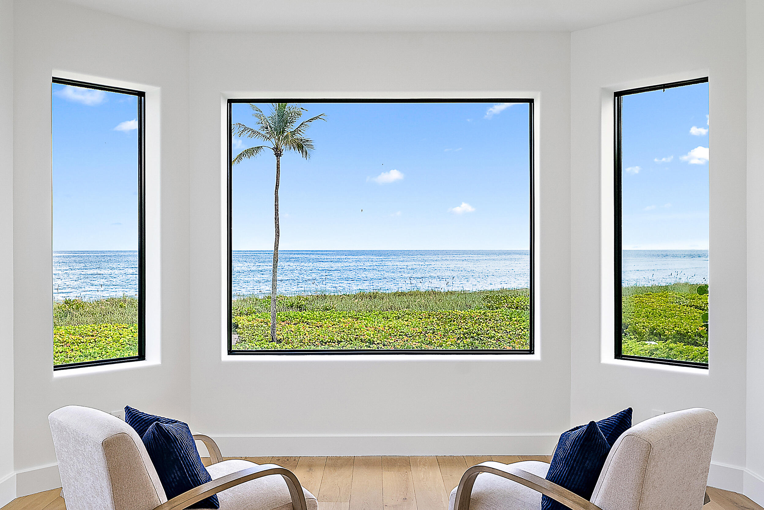 22 Ocean Drive Jupiter Inlet Colony, FL 33469 - Photo 20 of 36 a living room with furniture and a window