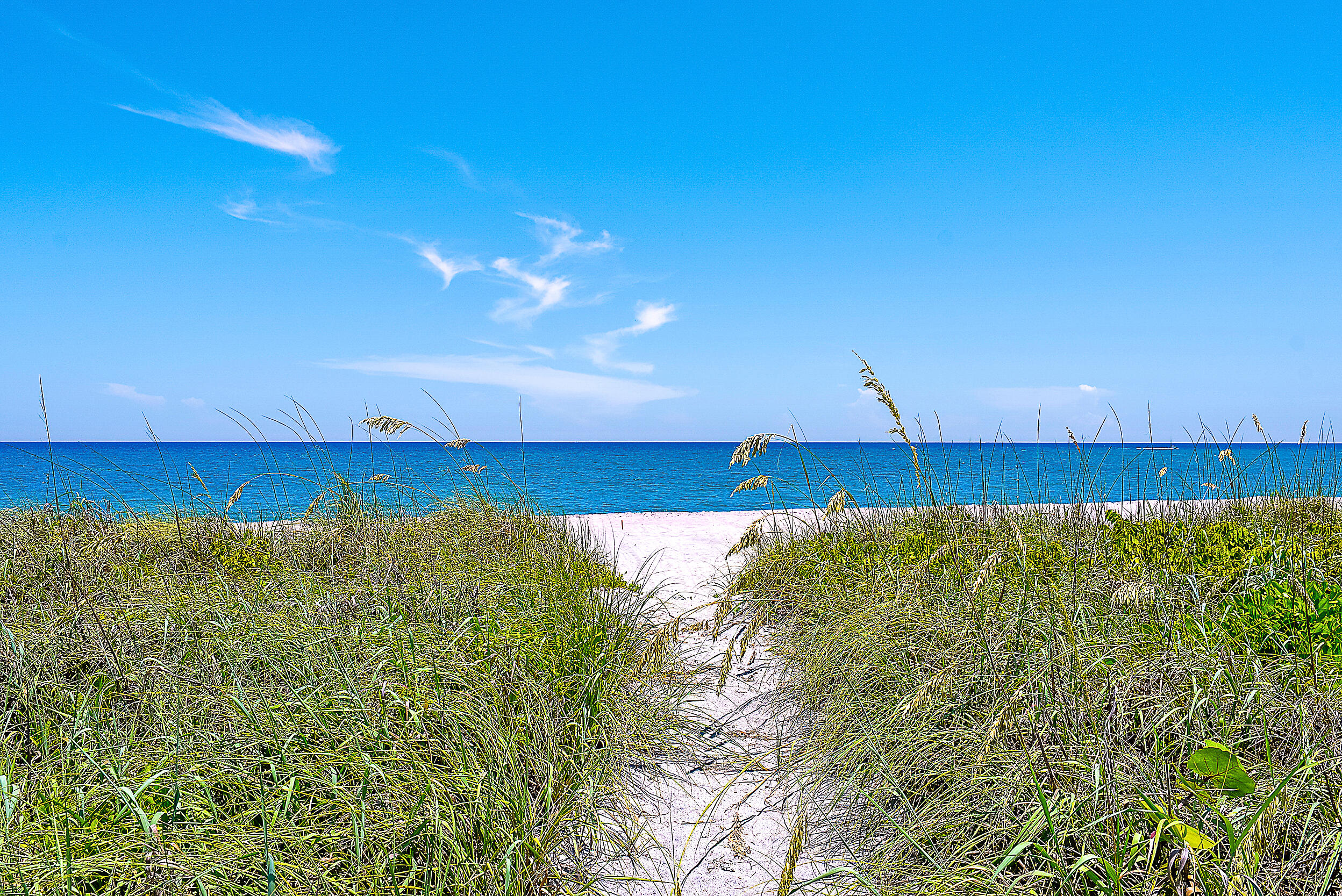 22 Ocean Drive Jupiter Inlet Colony, FL 33469 - Photo 32 of 36 a view of a swimming pool with an outdoor space and seating area