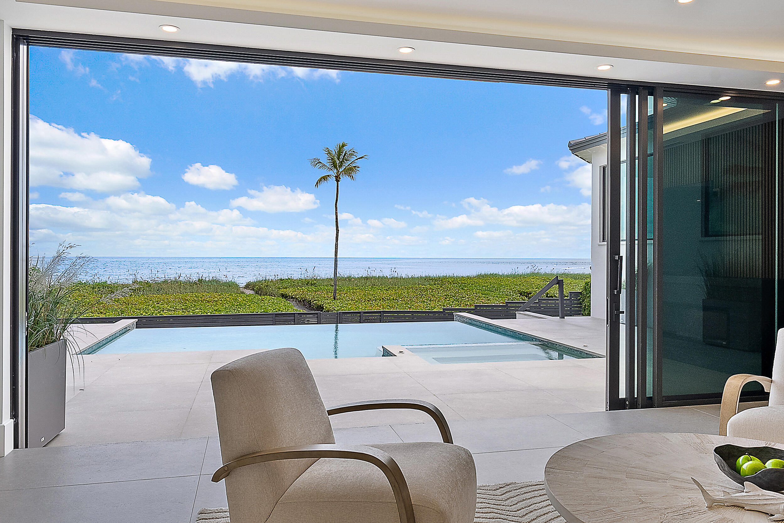 22 Ocean Drive Jupiter Inlet Colony, FL 33469 - Photo 10 of 36 a view of swimming pool from a balcony