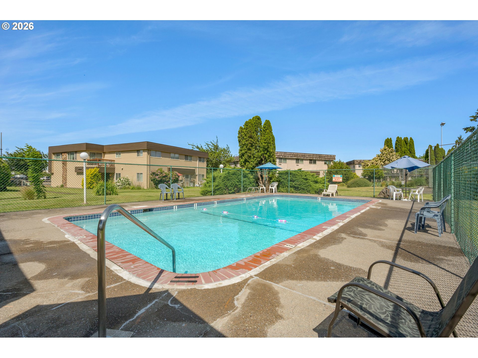 2727 Gateway Street, Unit 18 Springfield, OR 97477 - Photo 27 of 34 a view of a tennis court