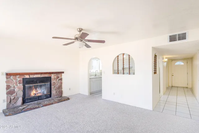 a view of a kitchen with a sink